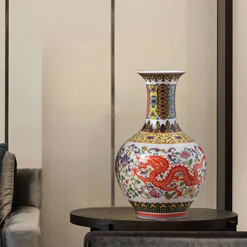 Flared-neck ceramic vase with a red dragon motif and yellow floral background.