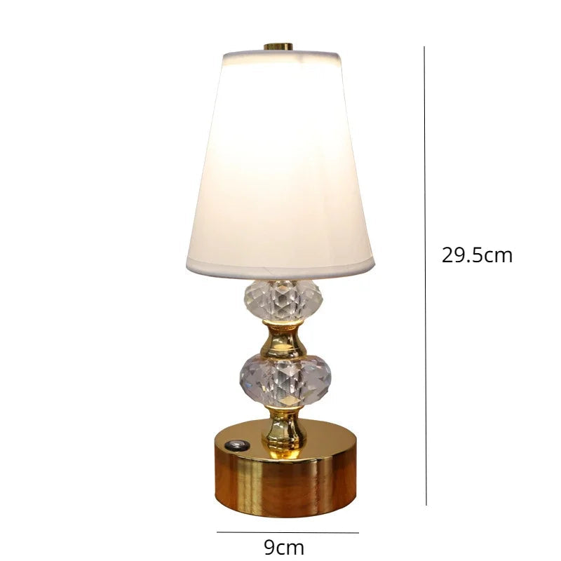 Table lamp with crystal base and white shade, shown with dimensions on a white background
