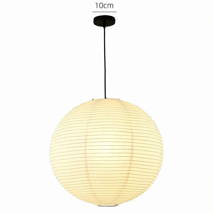 Round paper lantern with adjustable hanging wire on a light beige background