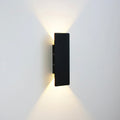 Black 6W compact rectangular wall light with minimalist finish and dual-direction glow