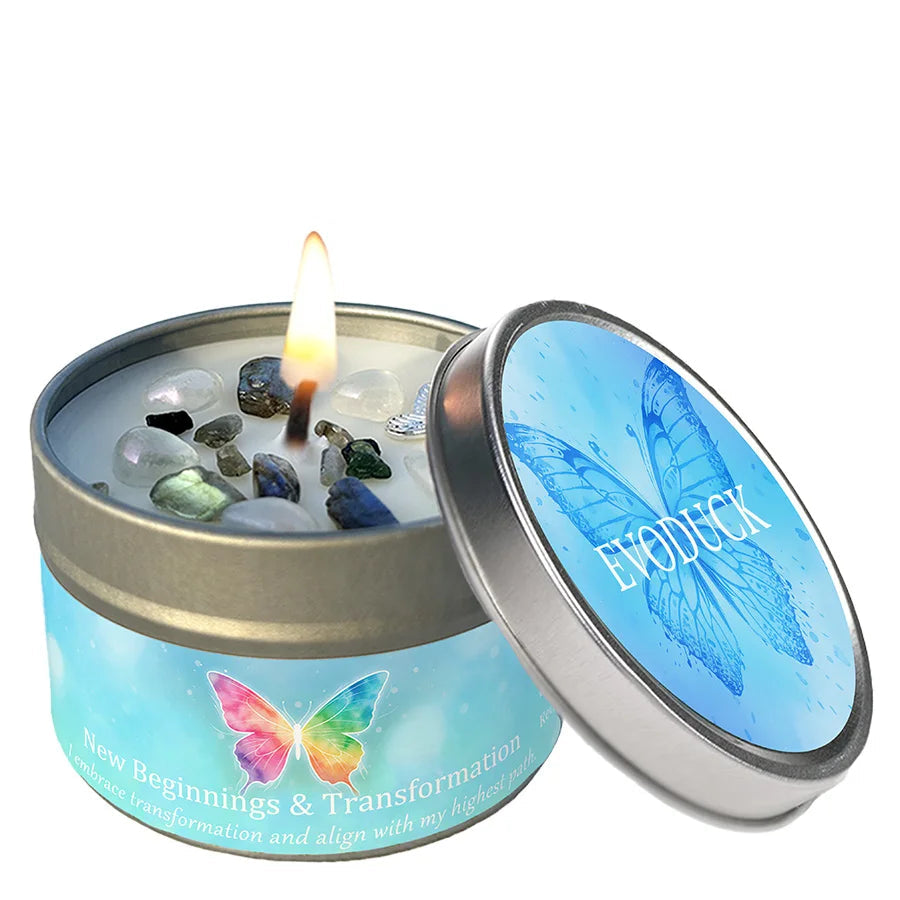 Transformation candle scent in a tin with a butterfly design.