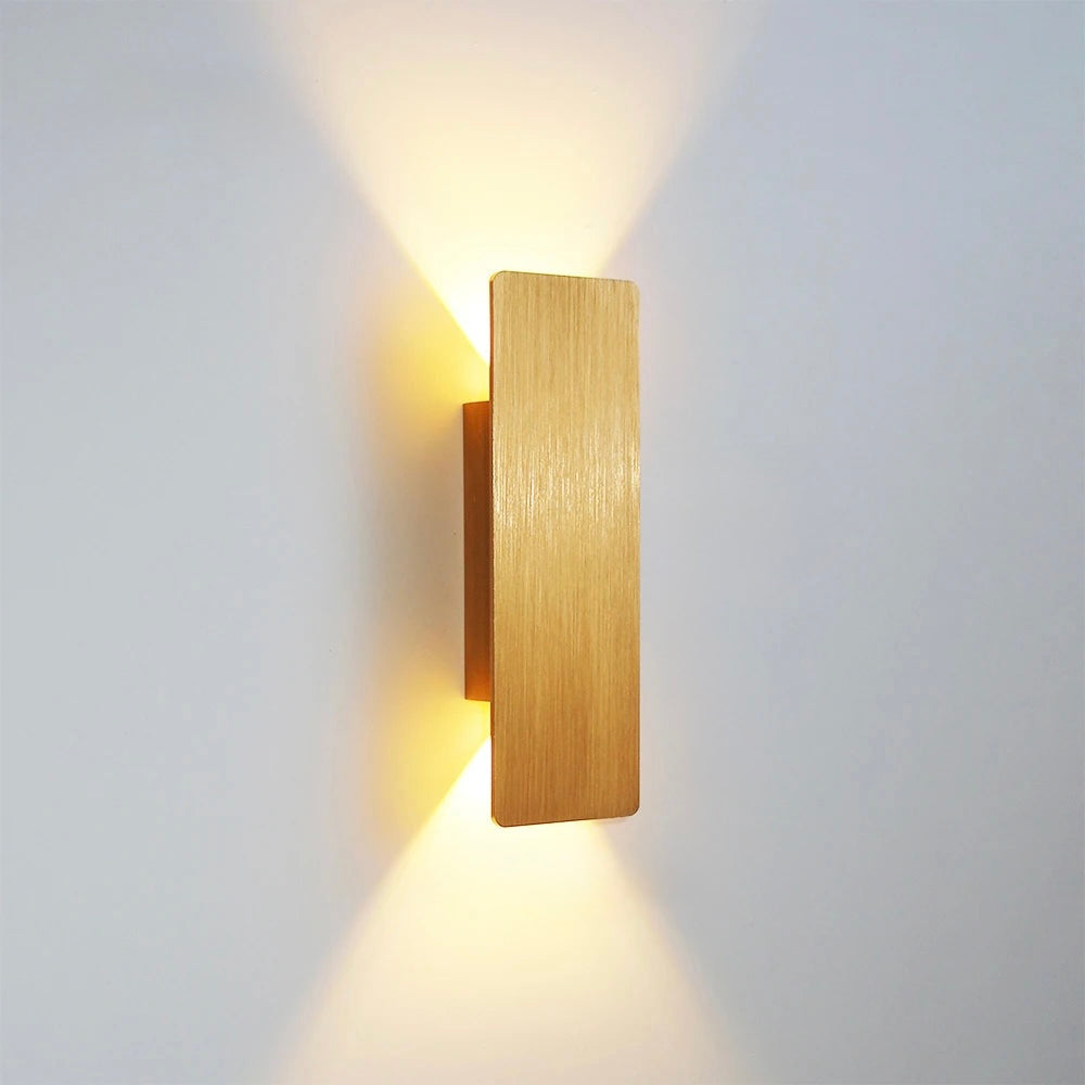 Gold 6W wall-mounted LED light with warm ambient up-and-down illumination