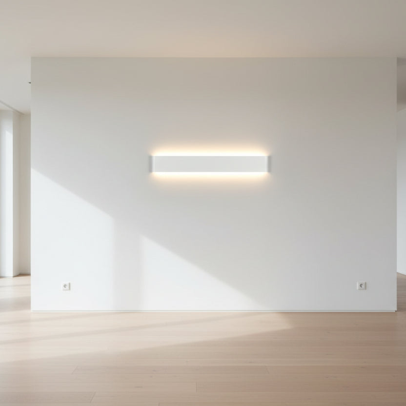 White aluminium LED wall light with soft diffused lighting on the wall