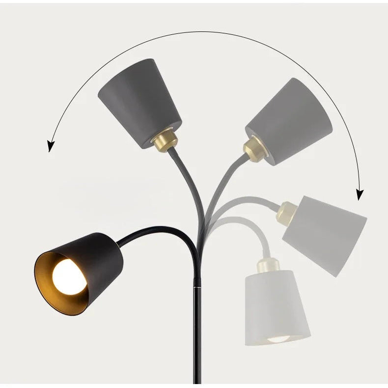 Black floor lamp with flexible adjustable lampshade shown in multiple angled positions