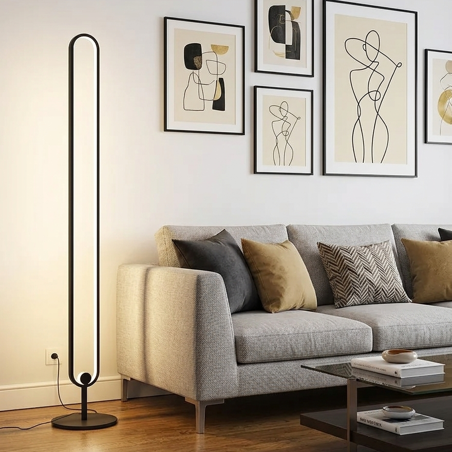 Oval Loop 128cm — Tall oval loop LED floor lamp with slim black frame and round base, 128cm high.