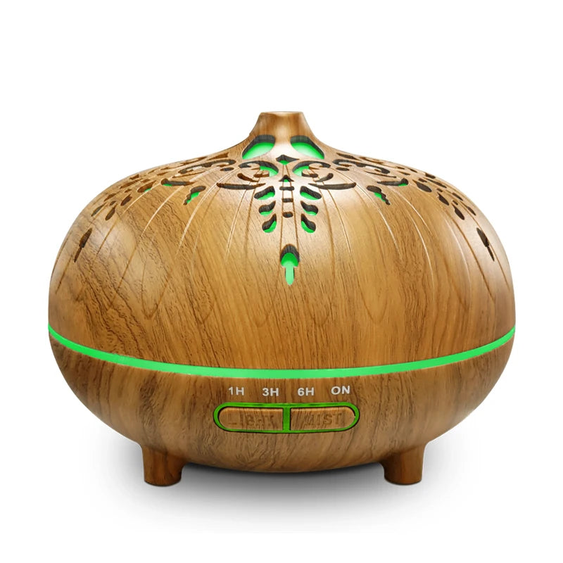 Wooden diffuser with green accents on a white background
