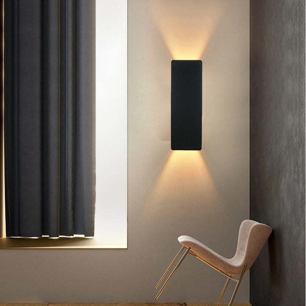 Black 6W compact rectangular wall light with minimalist finish and dual-direction glow