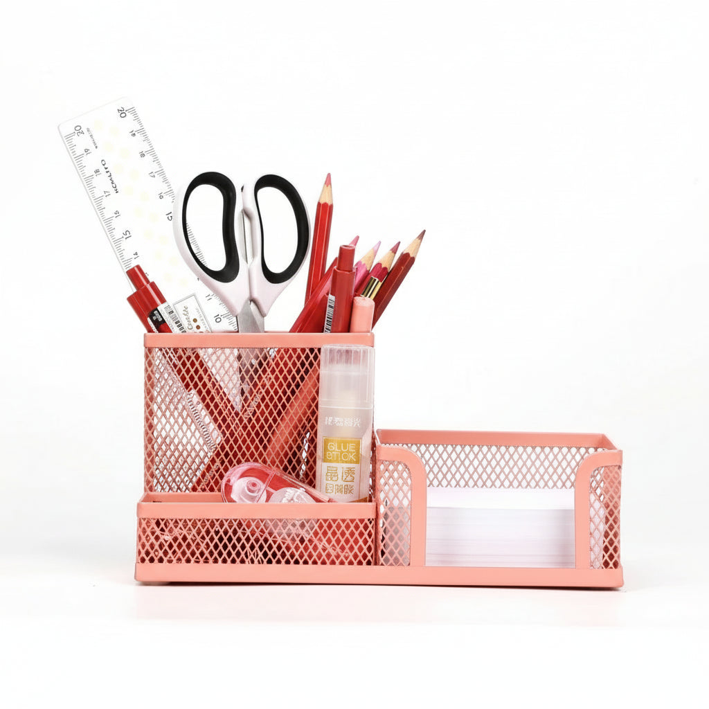 Pink mesh desk organiser with stationery items.