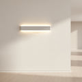 Silver minimalist LED wall light with warm ambient lighting effect