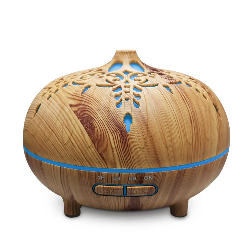 Wooden diffuser with intricate carvings on a white background