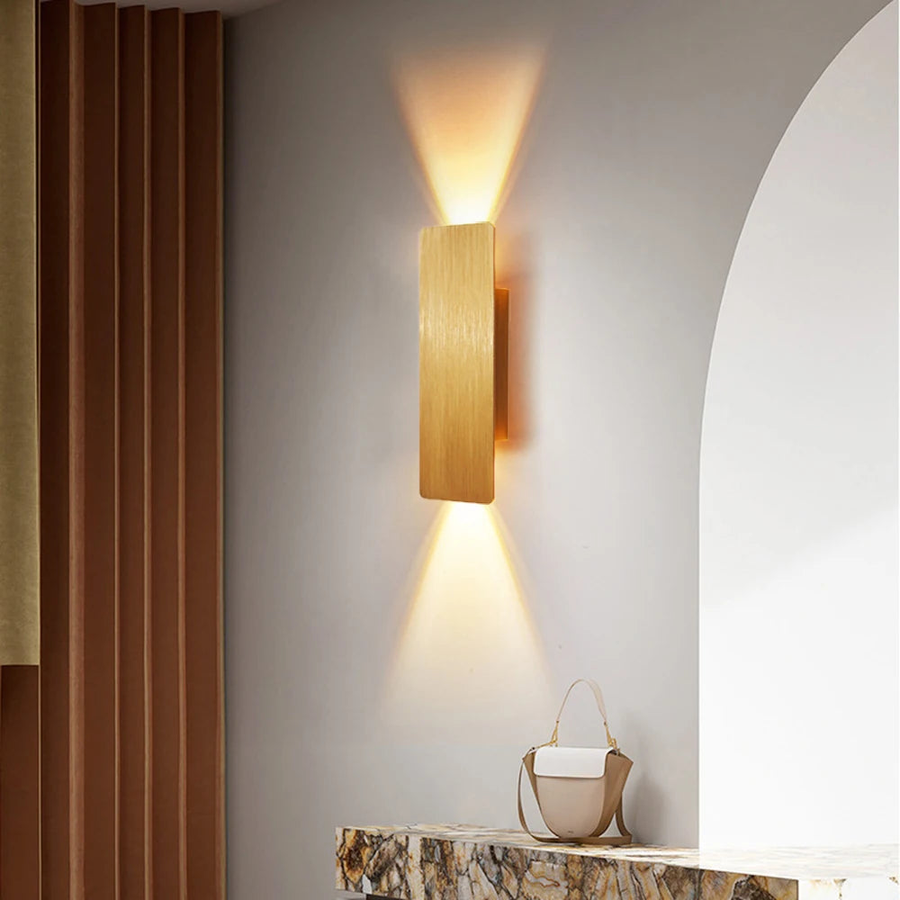 Gold 6W wall-mounted LED light with warm ambient up-and-down illumination