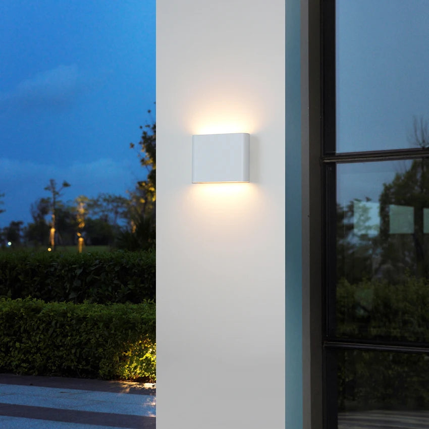 White 6W LED wall light with soft, warm-white up-down.