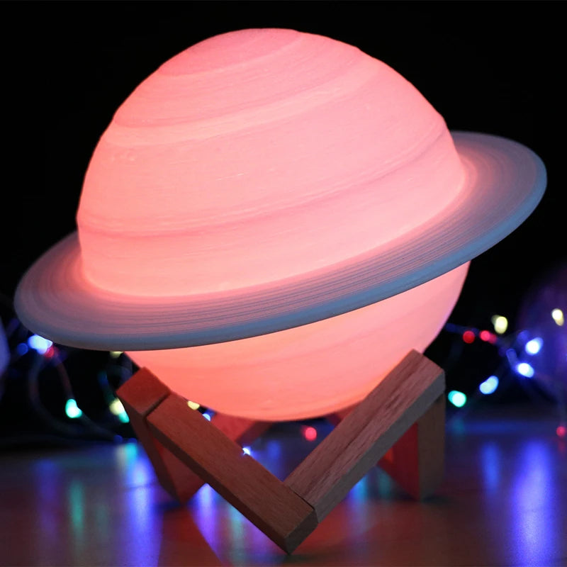 LED Saturn-style night light with coloured glow