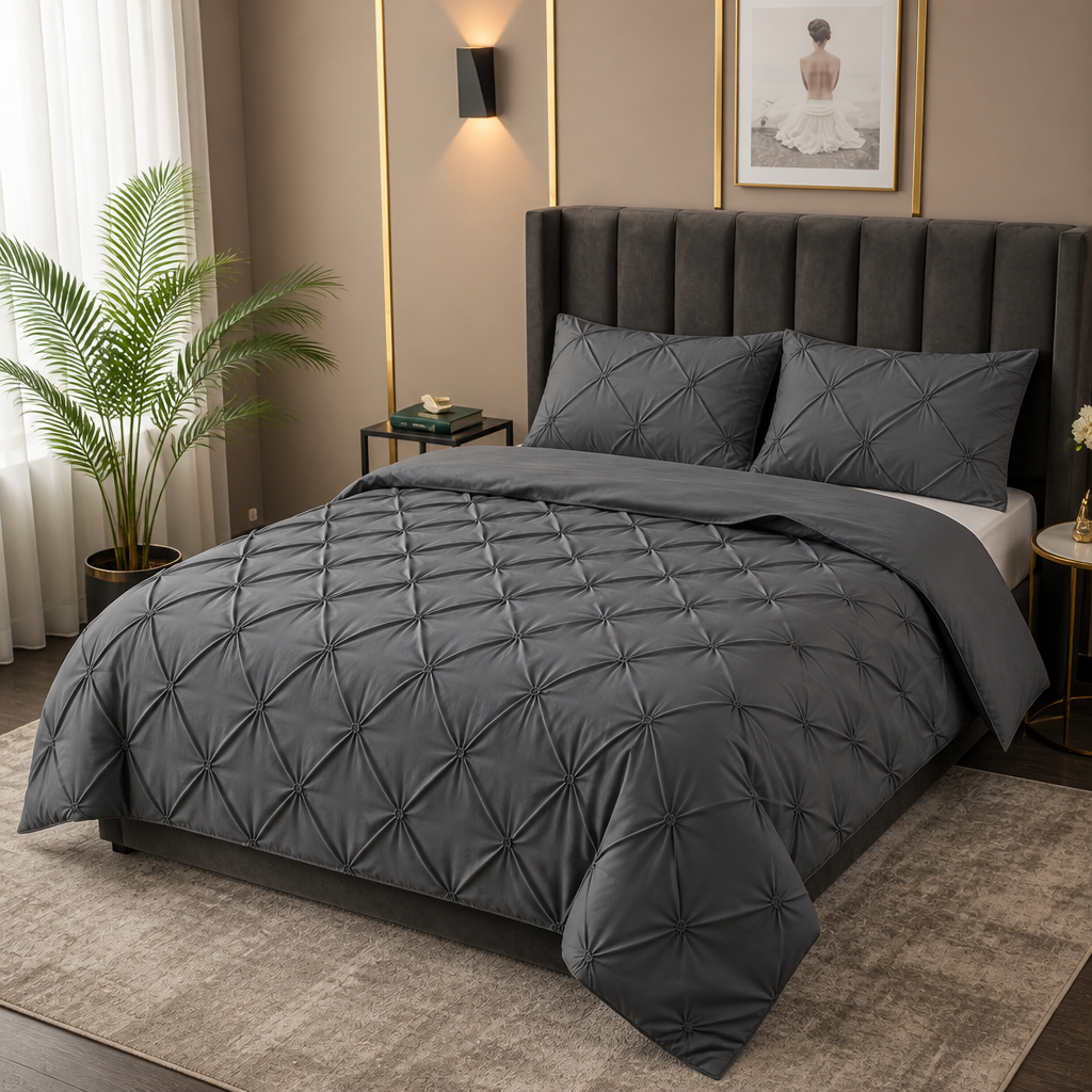 Grey 3D pinch pleated duvet cover set with matching pillowcases in a modern bedroom.