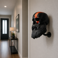 Black bearded skull decorative wall hanger with curved wall hook.