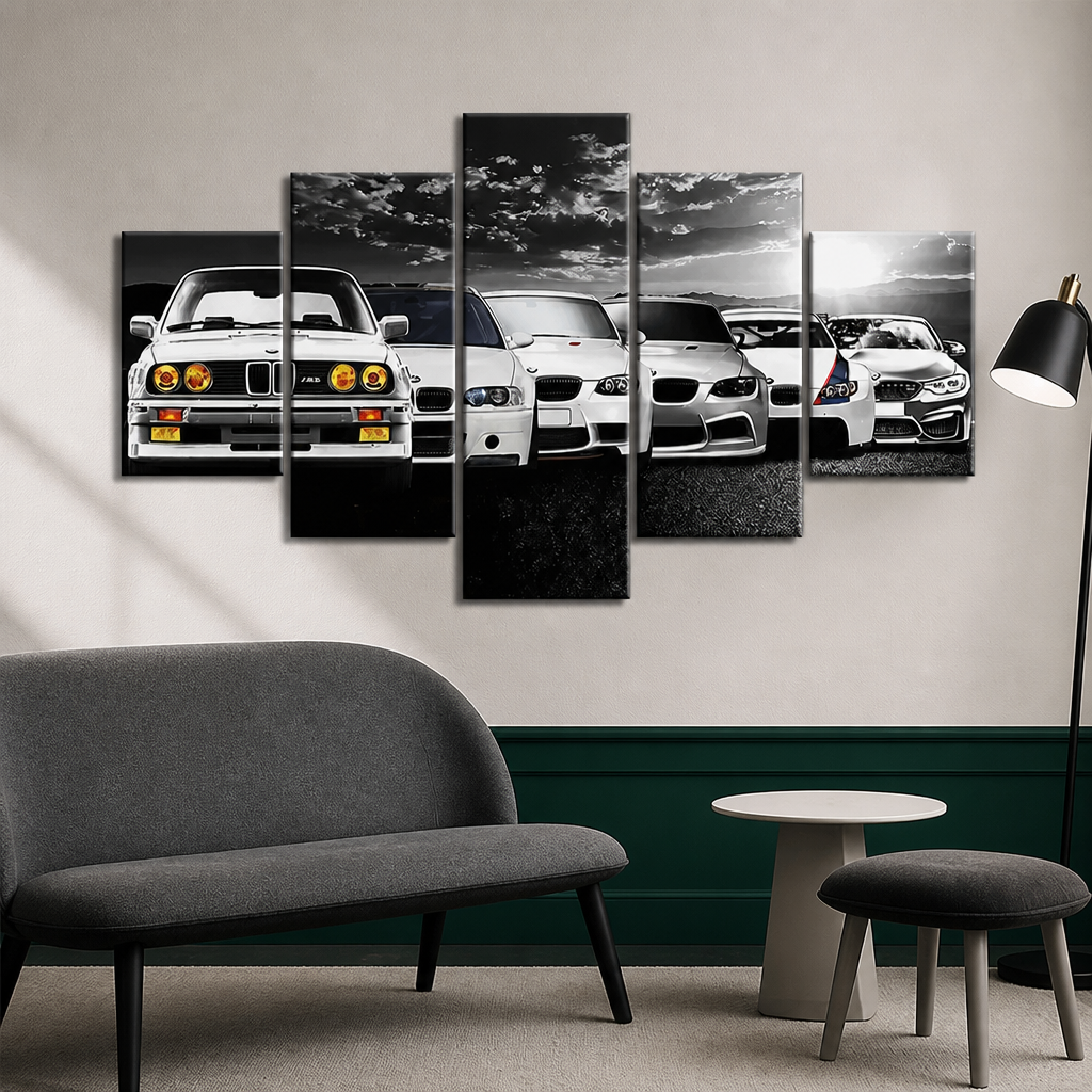 5-piece black-and-white automotive canvas print displayed above a grey sofa in a modern living room.