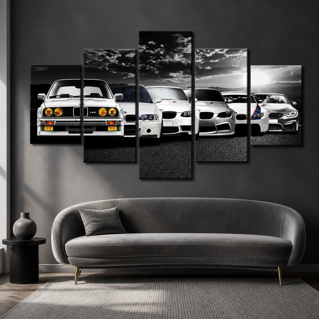 Five-panel canvas print of BMW cars on a wall above a grey sofa.