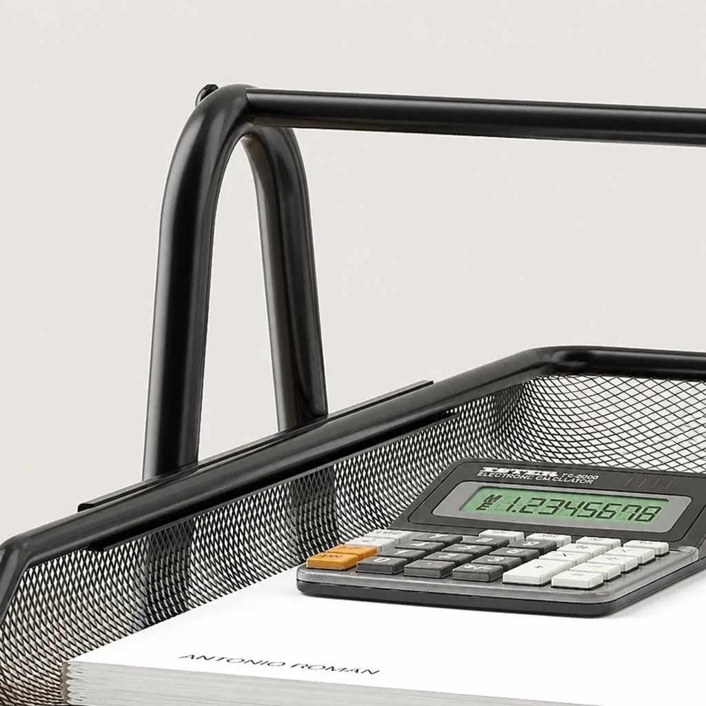 Calculator on a mesh desk organizer with a white background