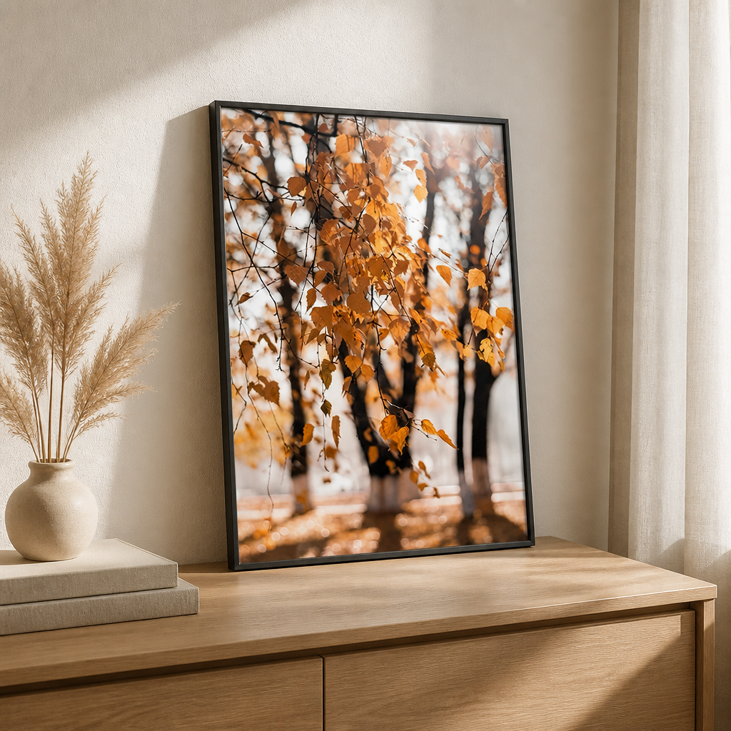 Autumn canvas print showing golden leaves hanging from thin branches in a soft park scene.