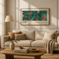 Wide floral gallery poster print with green and red botanical artwork leaning against a wall in a framed room setting.