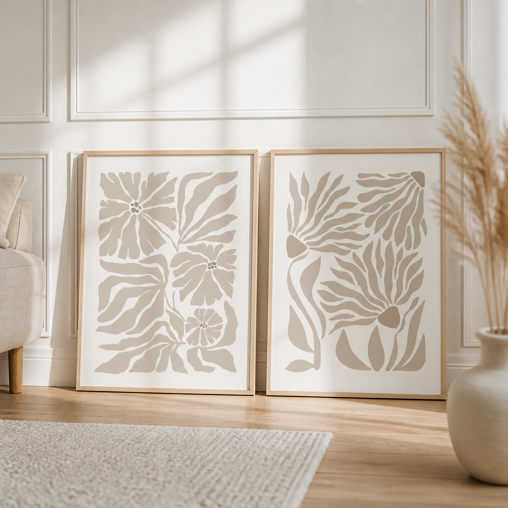 Two neutral abstract botanical canvas prints are together in a calm, minimalist room setting