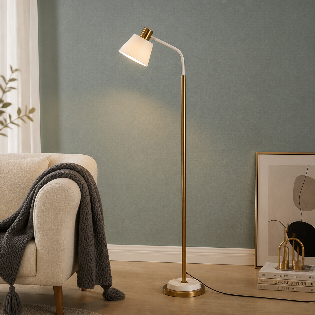 White arc floor lamp glowing warmly against a green wall