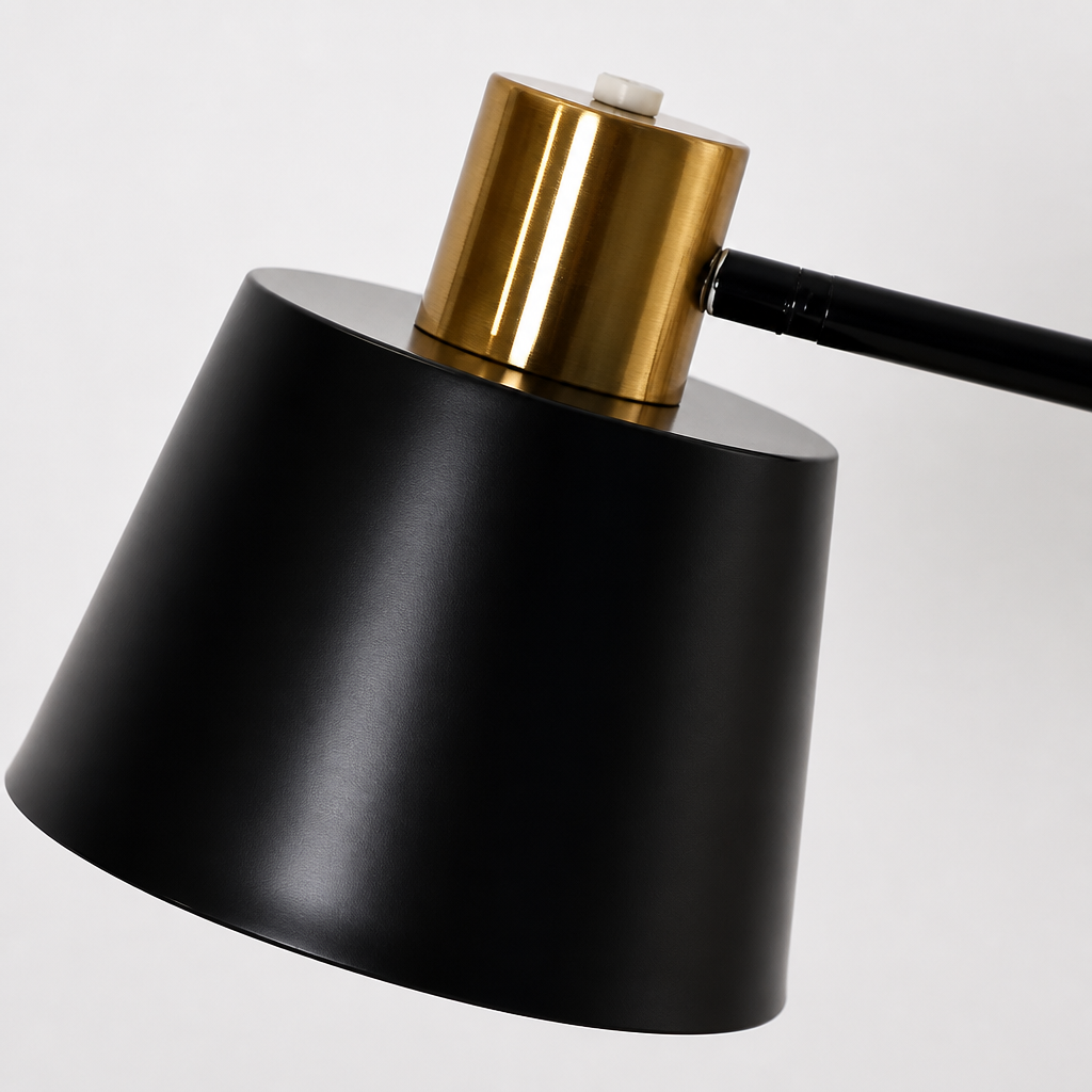 Black lampshade with gold top on a white background