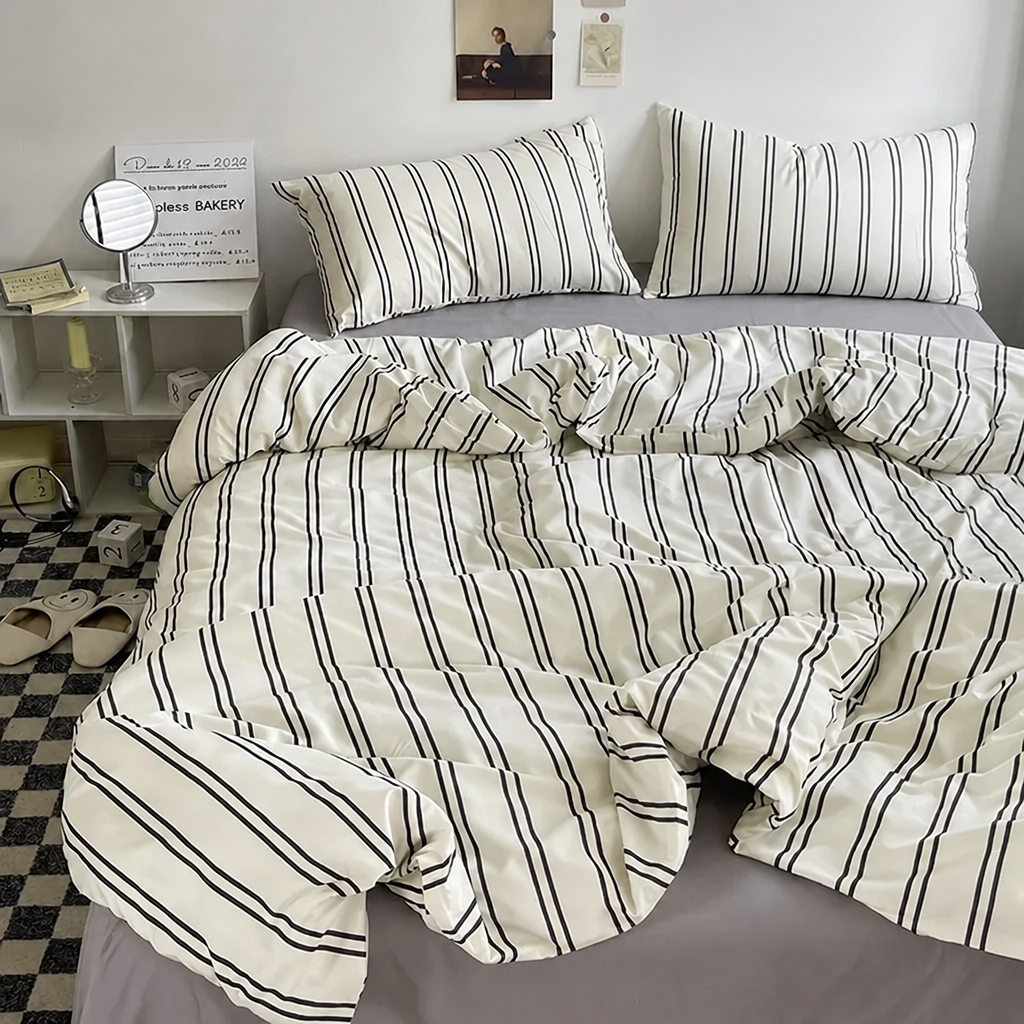 Cream bedding set with double black stripes and matching pillowcases