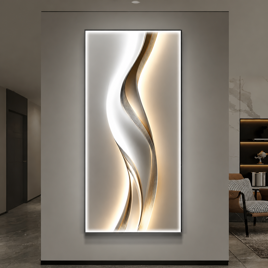 Gold and silver ribbon wave LED backlit wall panel glowing on a grey wall