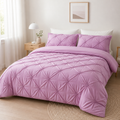 Pink 3D pinch pleated duvet cover set in a bright bedroom with matching pillowcases.