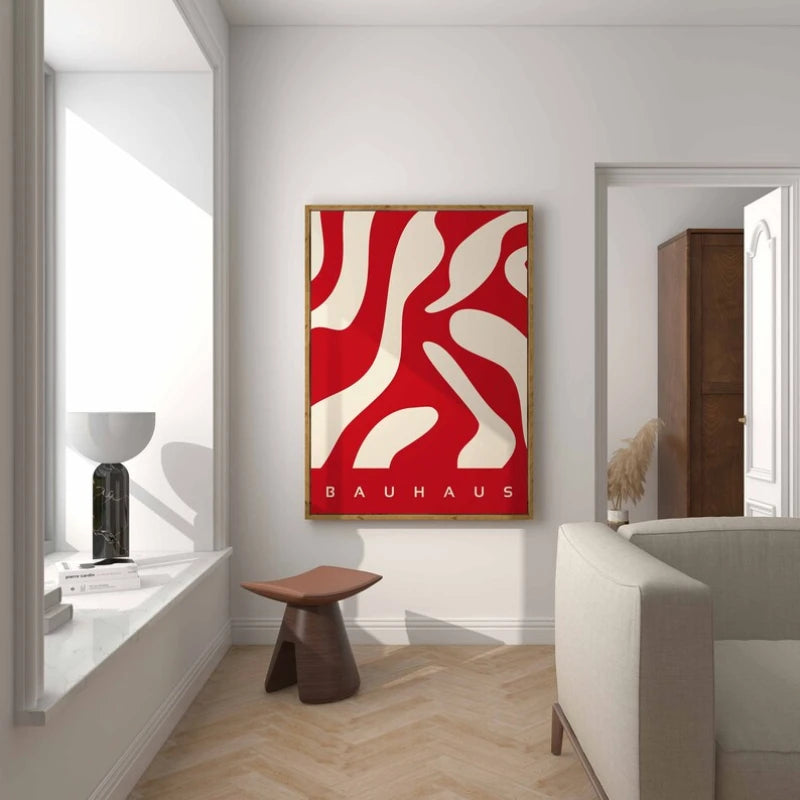 Bauhaus red abstract print with cream cutout shapes on a vivid red background