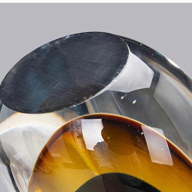 Close-up of thick glass base showing weighted construction