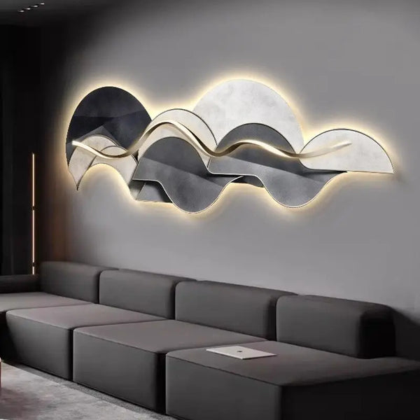 Large sculptural LED wall light with warm backlit glow and wave-inspired abstract design