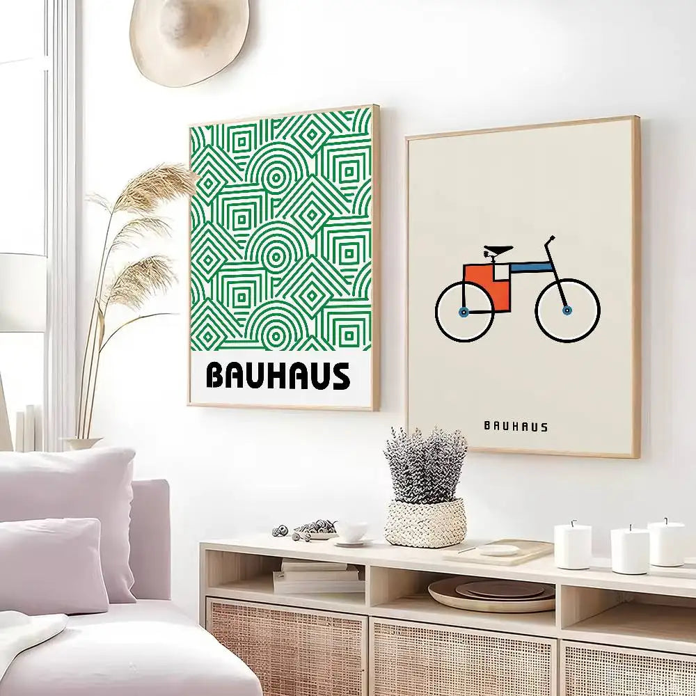 Living room with 'Bauhaus' art prints and a sofa.