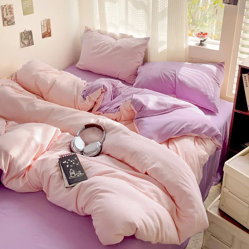 Pink and lavender two-tone cotton bedding set with layered pastel styling