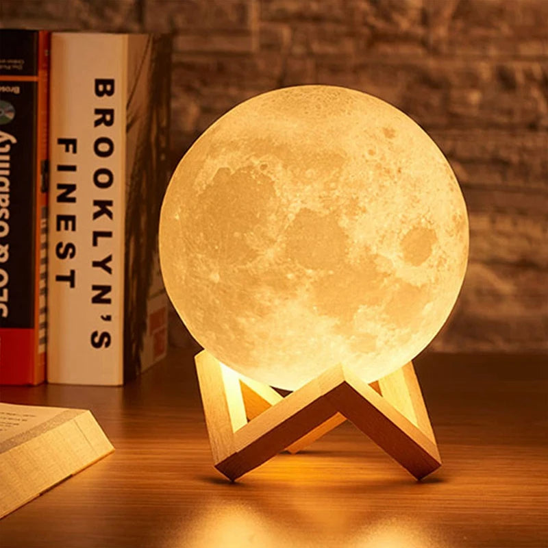 Moon lamp on a wooden stand with books in the background