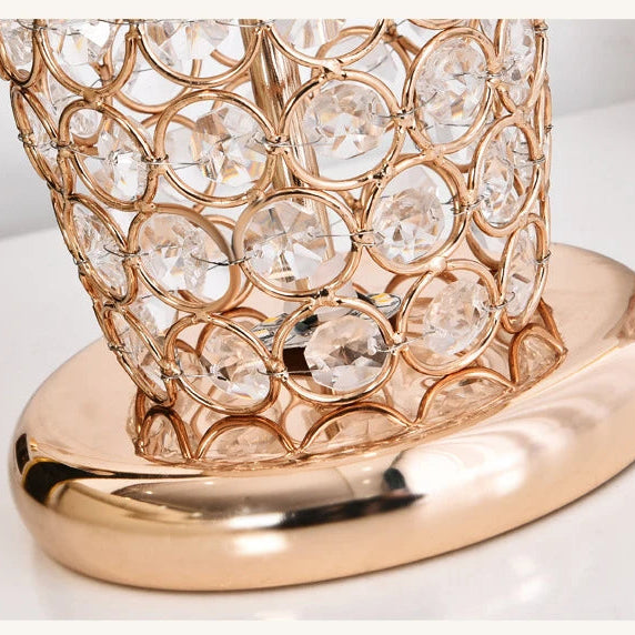 Decorative lamp with crystal details on a white background