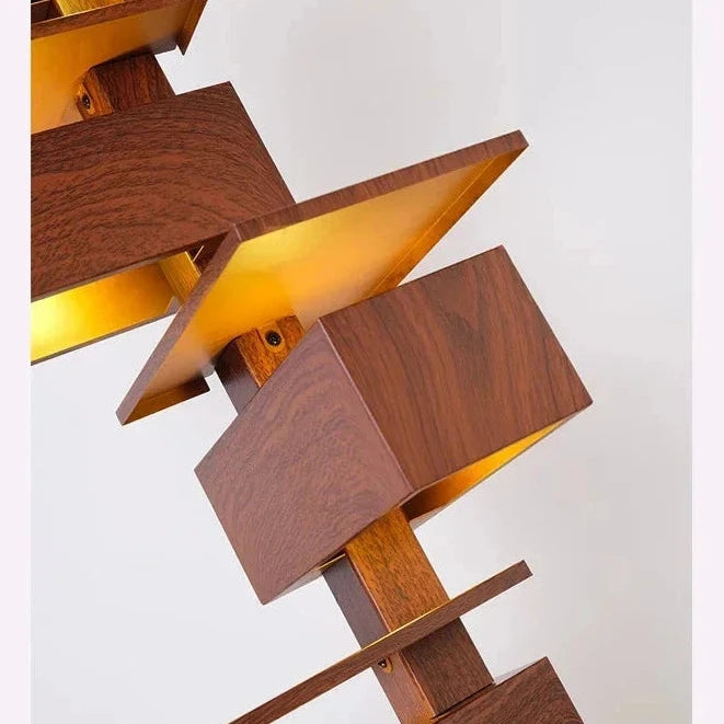 Detailed close-up of a rosewood grain geometric lamp showing stacked rectangular and flat elements