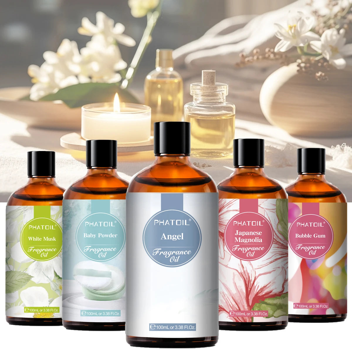 Collection of fragrance oil bottles with floral and candle background