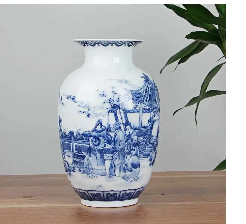 Blue and white ceramic vase with intricate designs on a wooden surface.