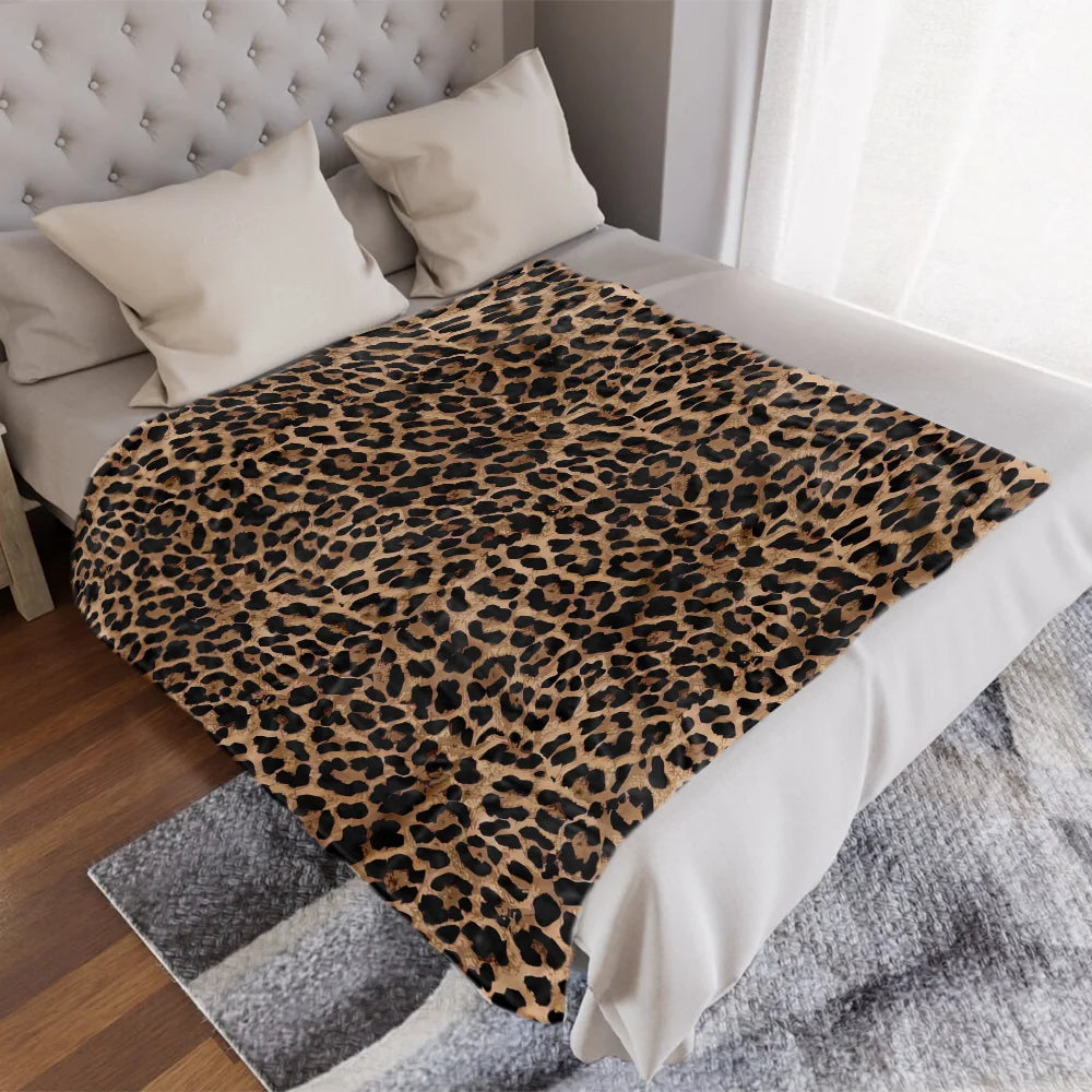 Soft leopard pattern fleece blanket.