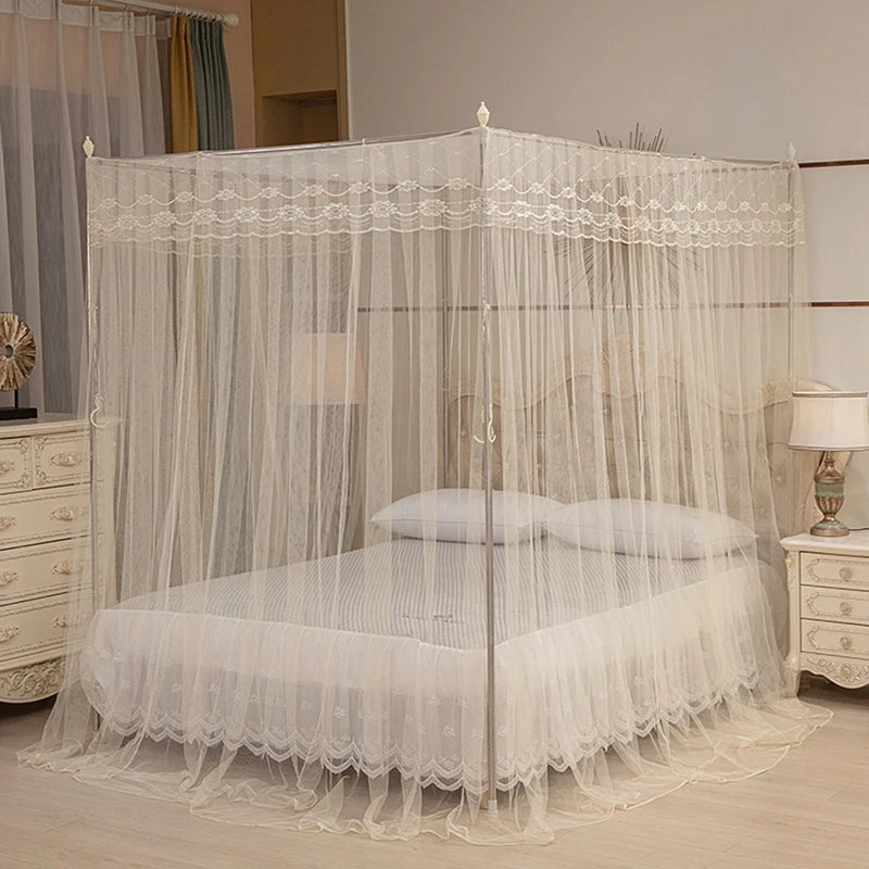 Light yellow four-poster lace canopy mosquito net draped over a bed