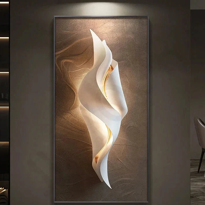 Lumina Flow LED wall art light with compact twisted white ribbon design and warm gold glow on a brown textured canvas