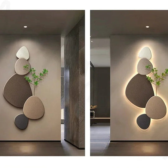Neutral stone decorative LED wall light with organic shapes, plant detail, and warm ambient glow