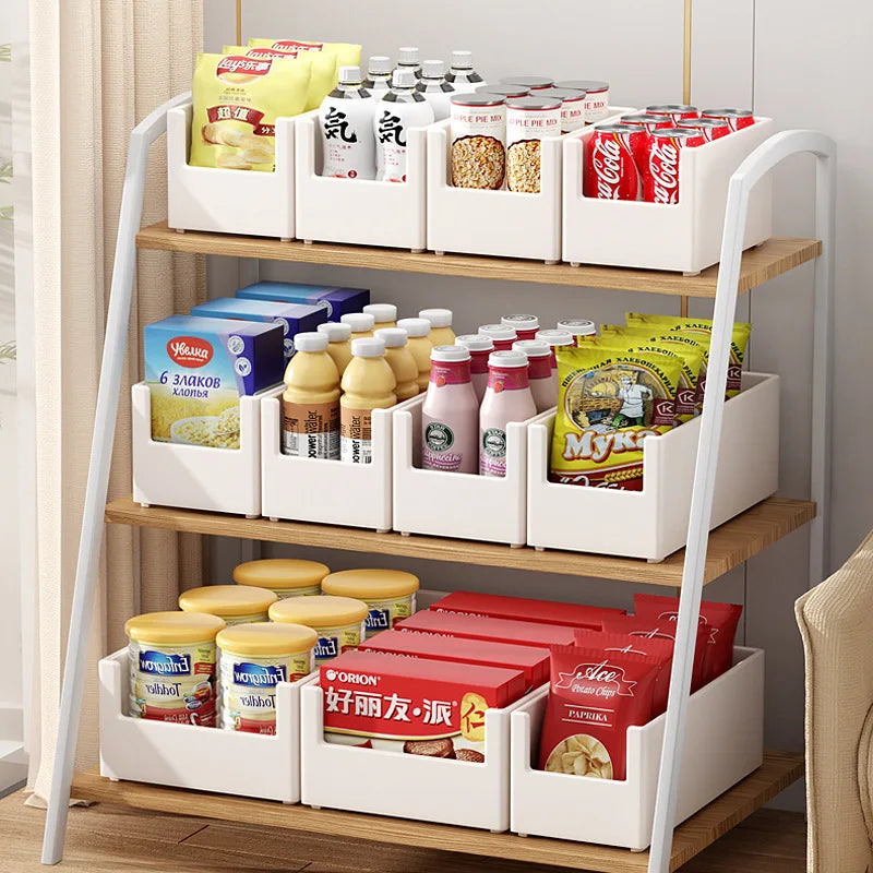 Three-tiered storage rack with various food items on a wooden floor.