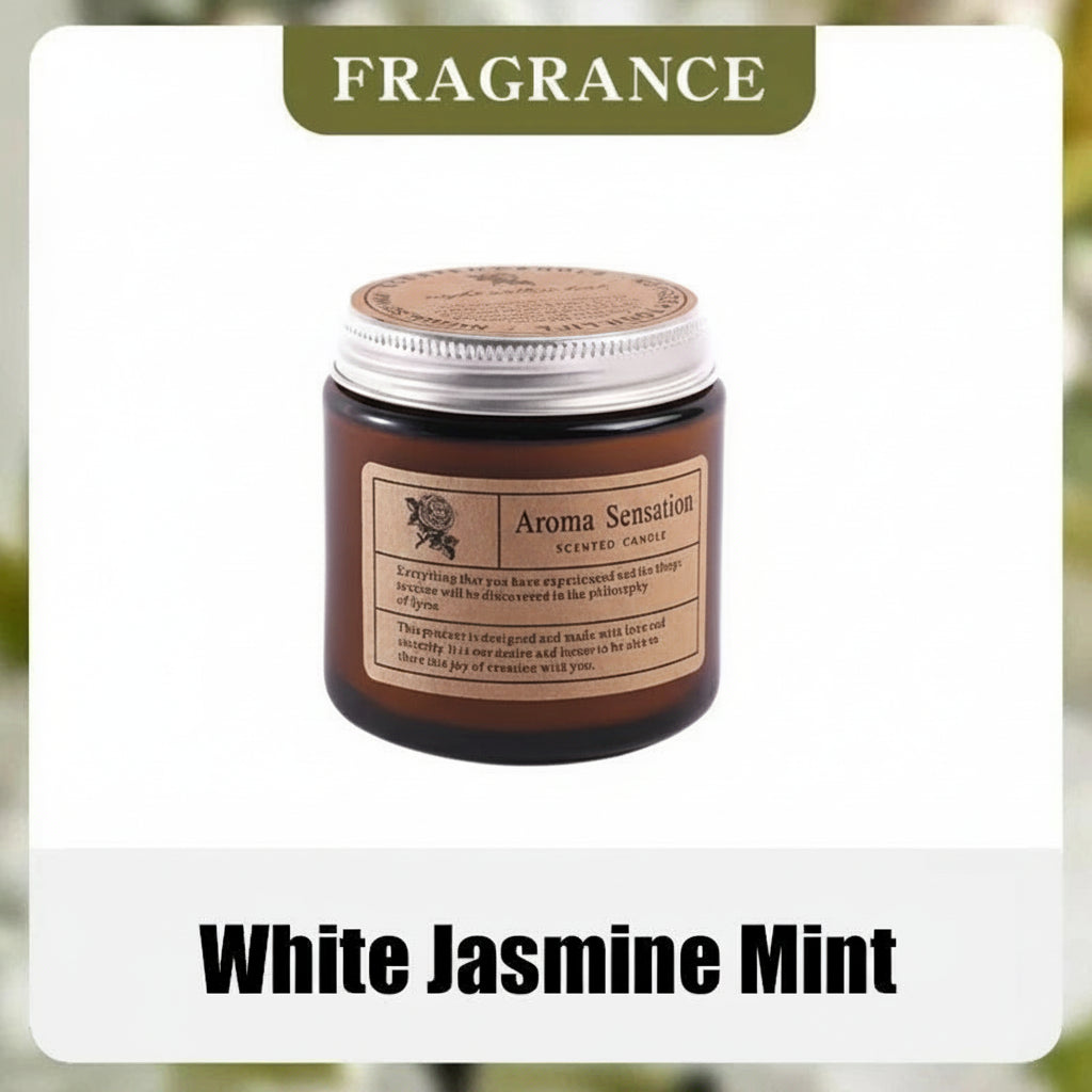 Aroma Sensation scented candle labeled 'White Jasmine Mint' with fragrance notes on a blurred natural background.