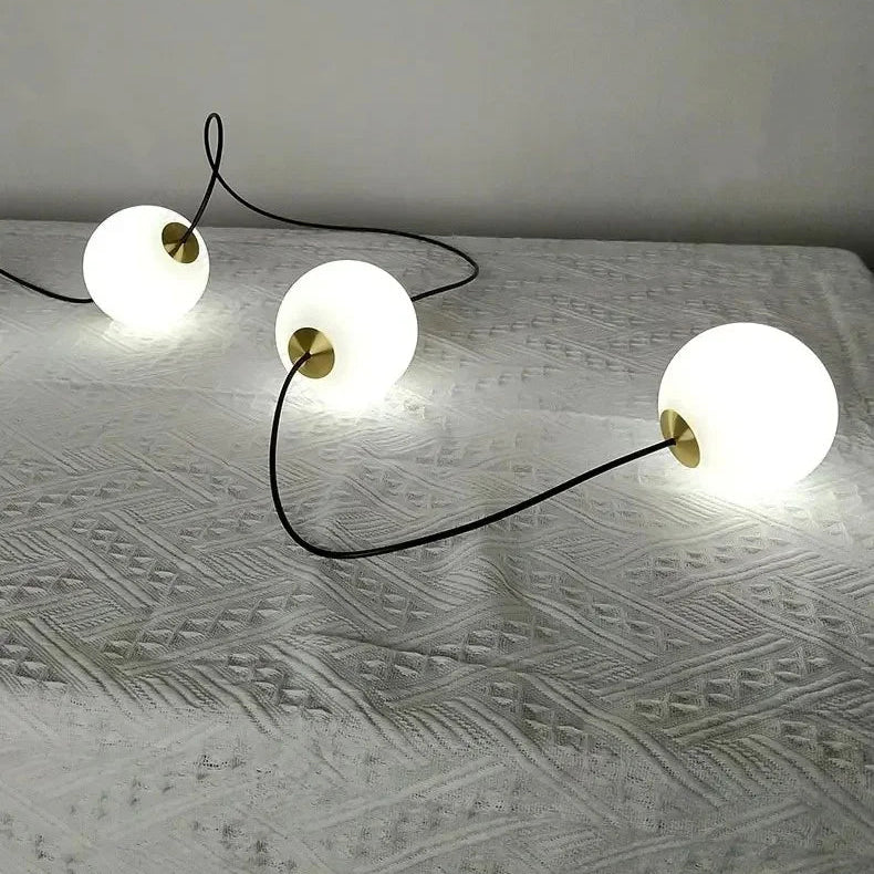 String of three white spherical LED Globe Lights.