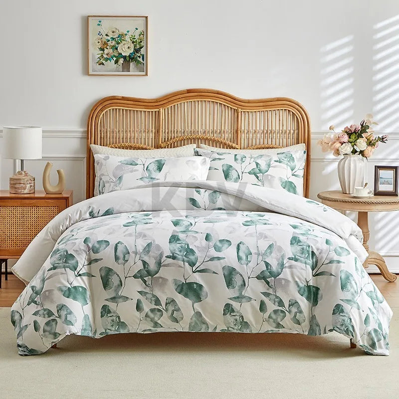 White duvet cover set with green eucalyptus leaf print and matching pillowcases