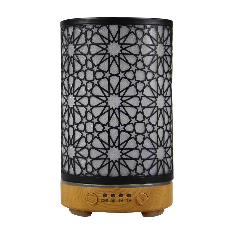 100ml black star pattern essential oil diffuser with light wood grain base.