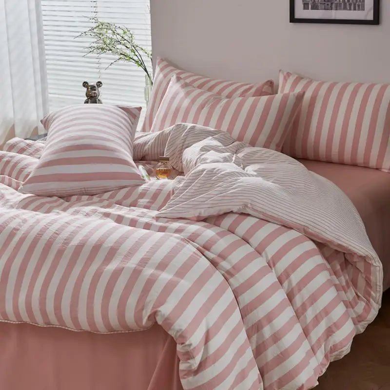 Blush pink and white striped duvet cover set with flat sheet and pillowcases